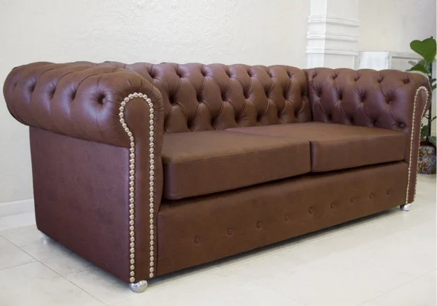 Sillón de dos cuerpos de estilo capitoné, elegante y clásico